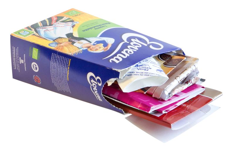 A colourful carton oatmeal package with other flattened carton packaging stuffed inside it.