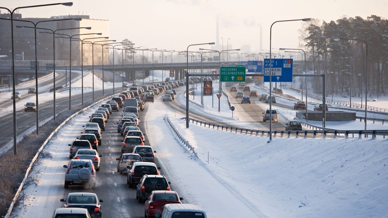 A wintry photo of the traffic route with a lot of cars.